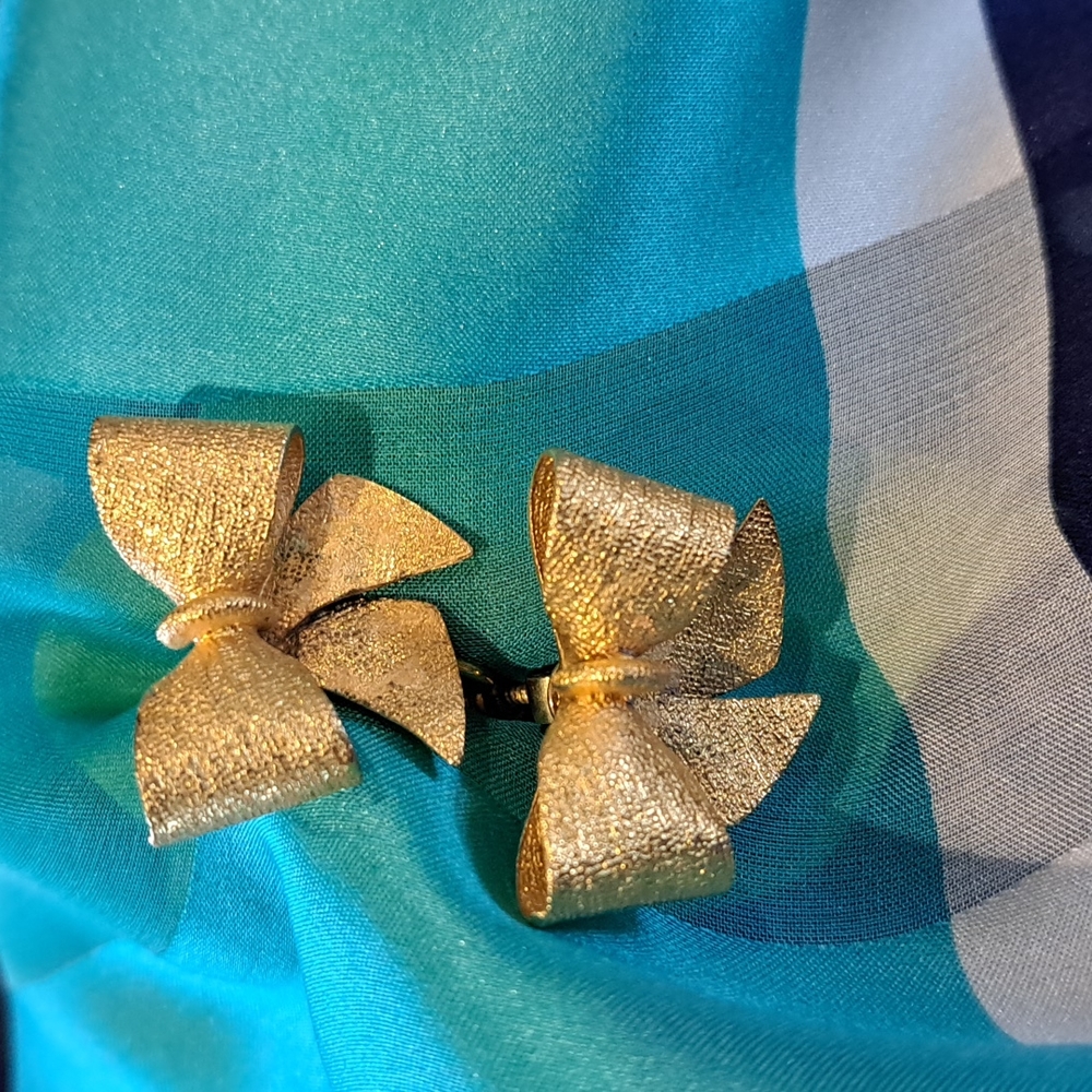 Bow earrings gold tone Metal textured screw back/ clip on